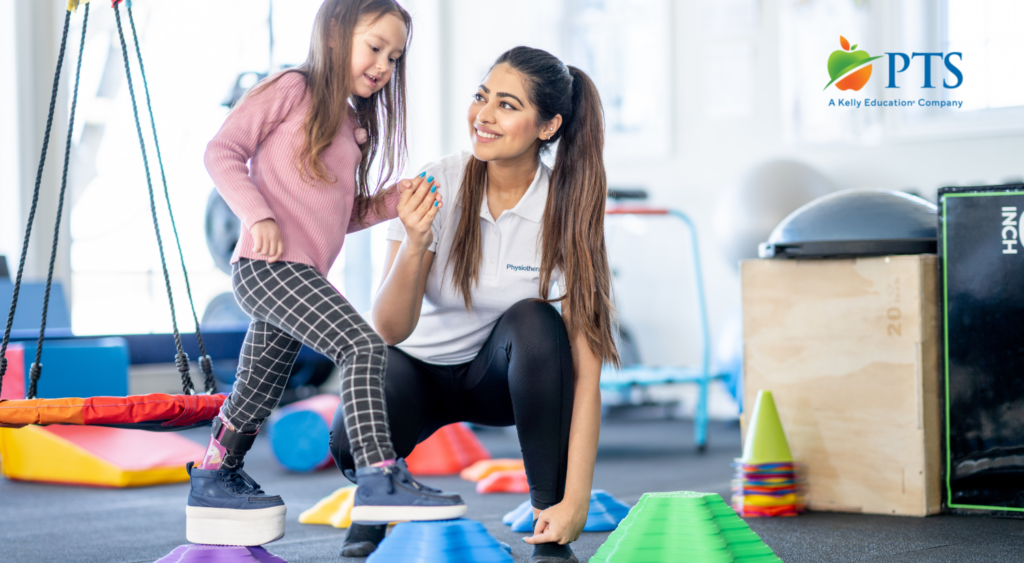 pediatric physical therapist with student
